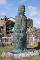 Carved wooden monument at Lindisfarne Priory